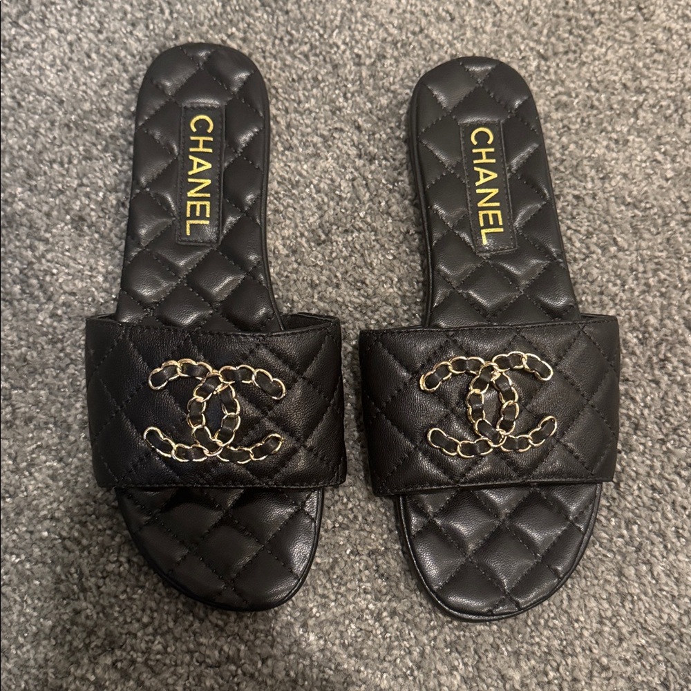 Chanel Logo Black Quilted Slides with Gold Accents